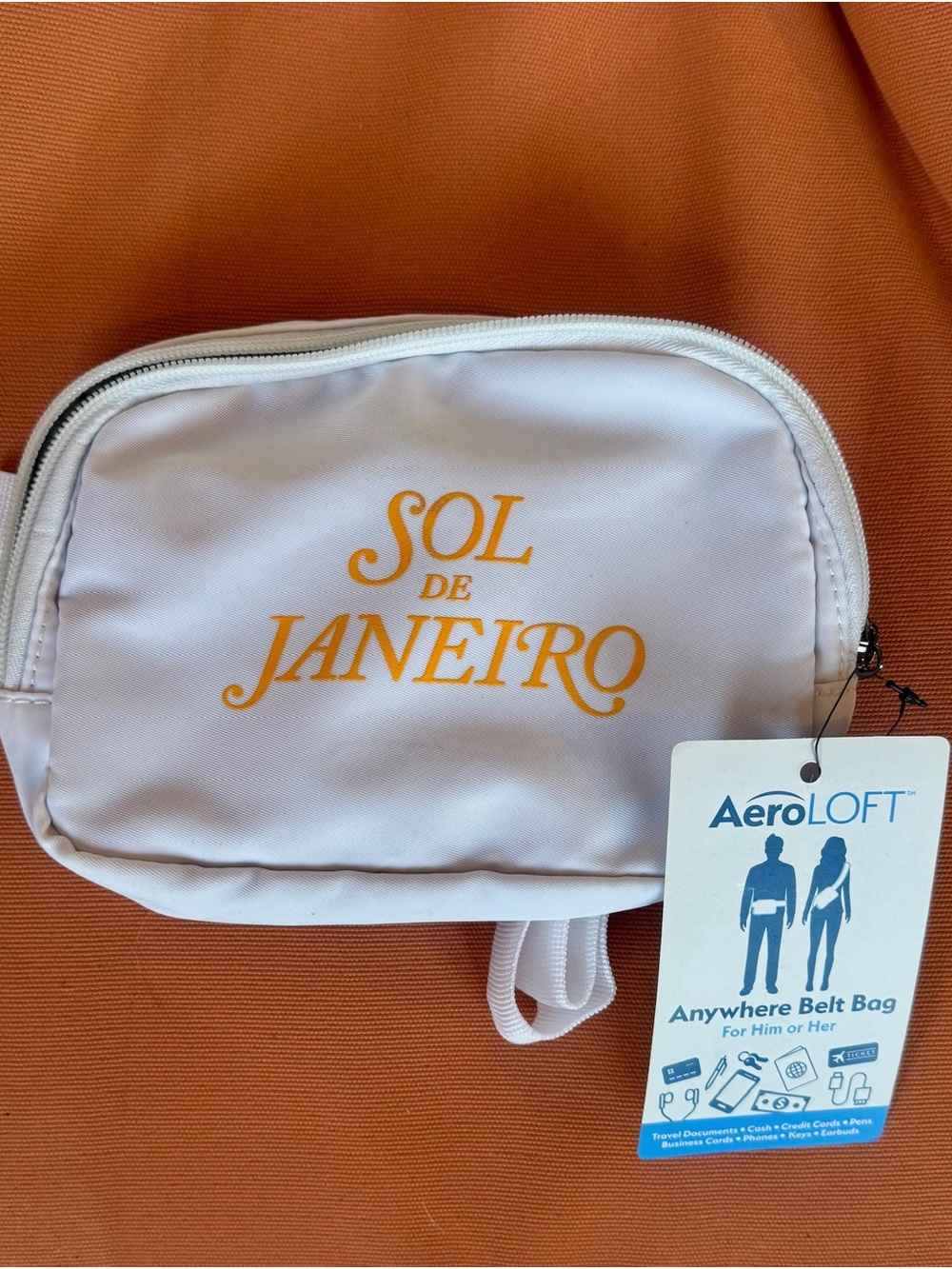 Sol de Janeiro White Crossbody Belt Bag with Yellow Logo
